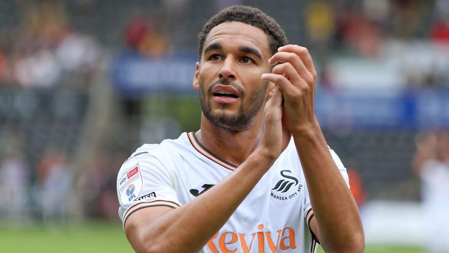 Ben Cabango applauds Swansea fans 