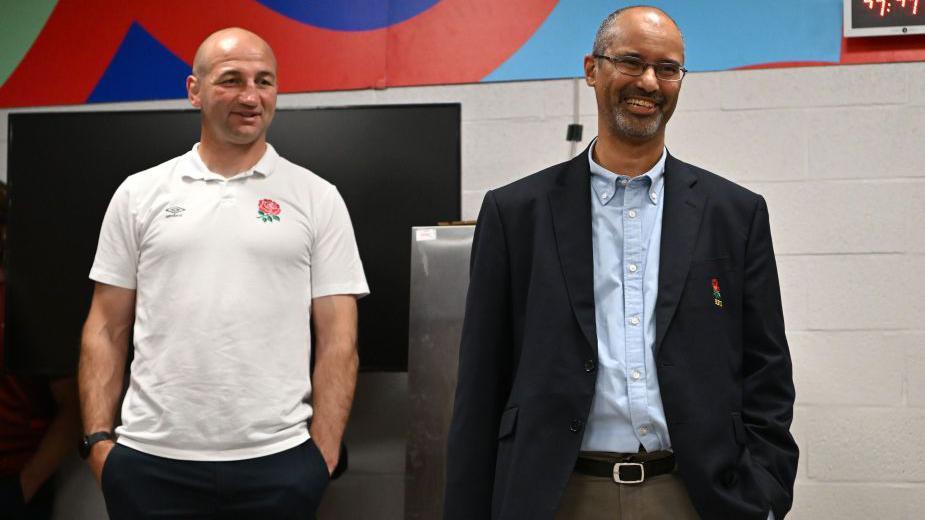 Tom Ilube with England head coach Steve Borthwick