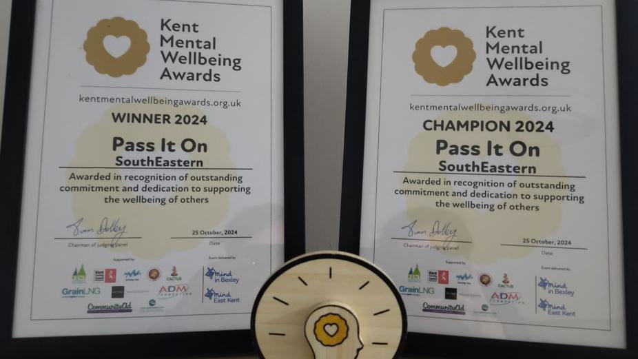 Certificates and a trophy for the Kent Mental Wellbeing Award, given to Southeastern Railways