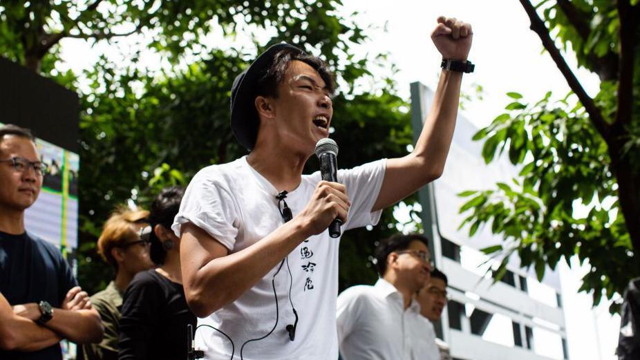 Jimmy Sham at a protest  