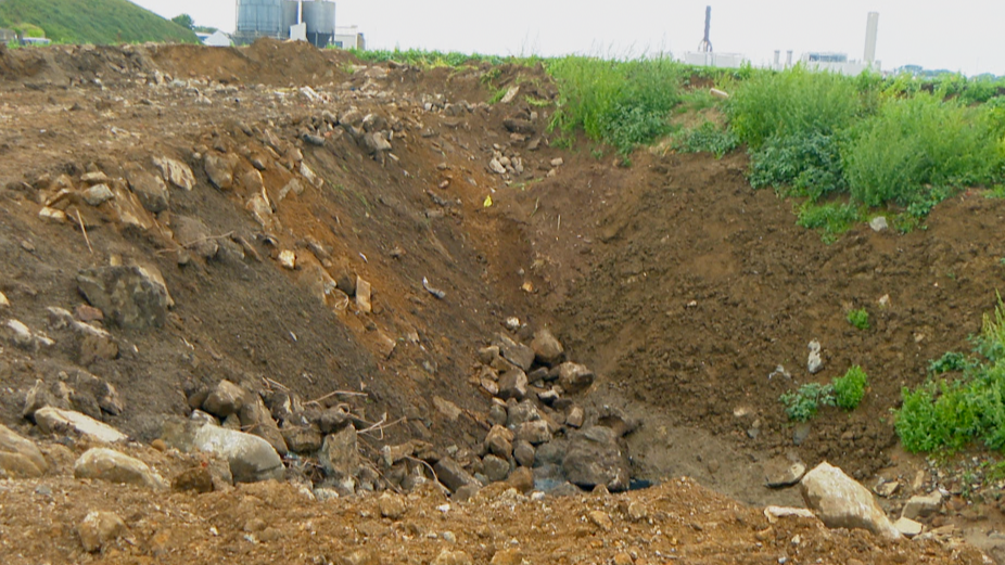 Image of the old Longue Hougue hole