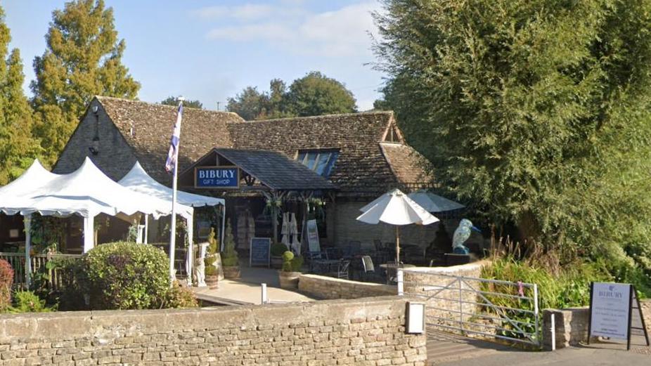 Entrance to farm with seating outside