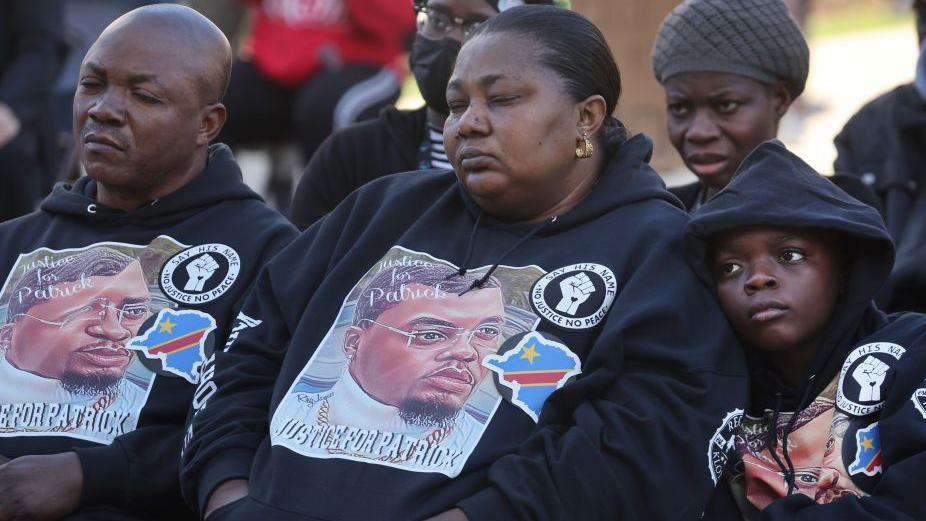 Supporters and family members of Patrick Lyoya, including his Father Peter (Left) and mother Dorcas (Centre)