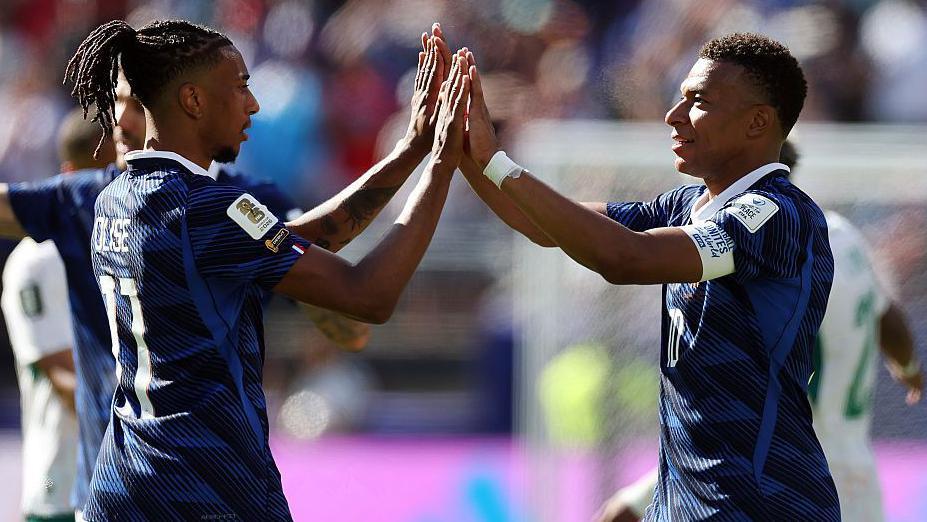 Michael Olise and Kylian Mbappe