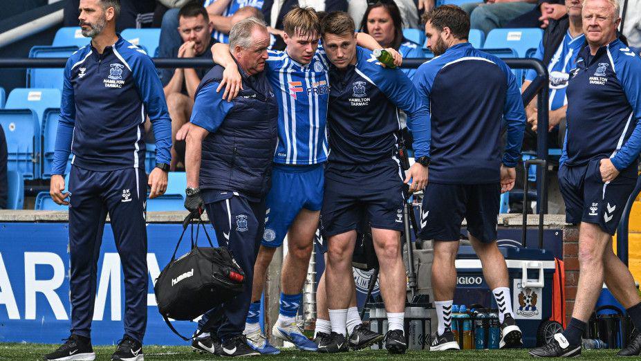 Kilmarnock's Ben Brannan goes off injured