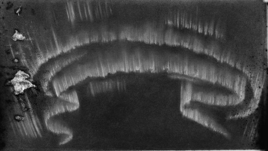 A grainy photograph of a sketch of the Northern Lights taken in the 19th Century