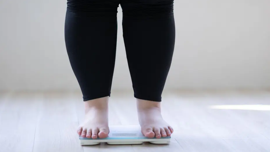 Person standing on scales