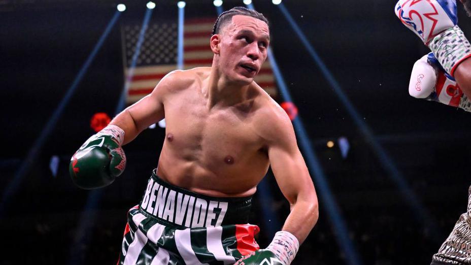 David Benavidez in the ring with green gloves