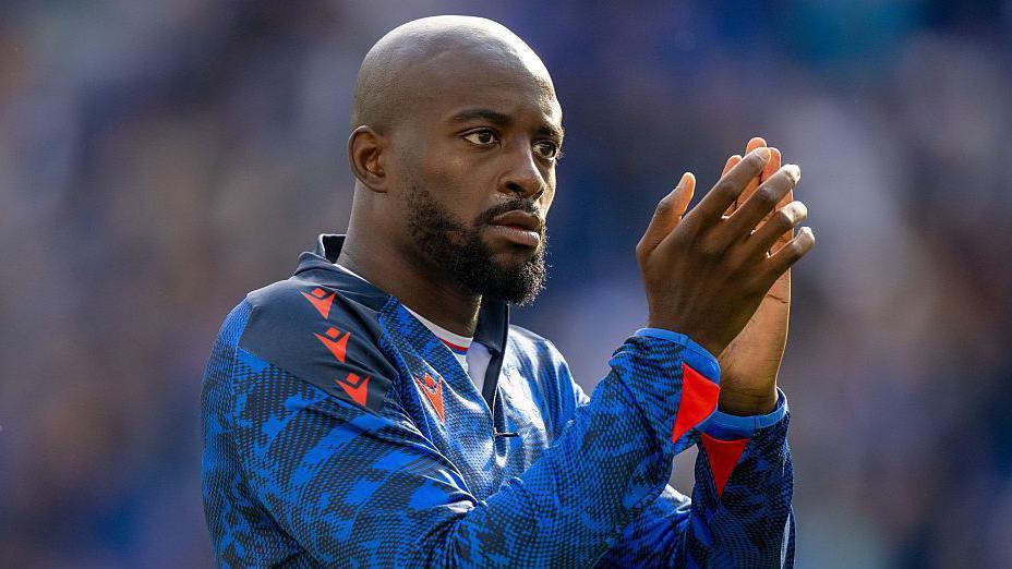 Jean-Philippe Mateta applauding towards Crystal Palace fans after the game at Everton