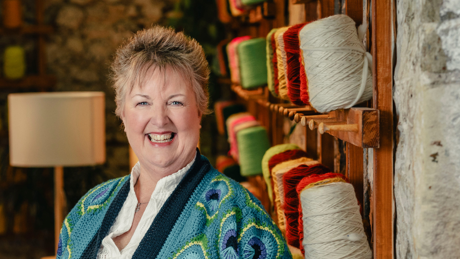 Stephanie was chosen from thousands of contestants to take part in the series. She is pictured wearing a green colourful knitted cardigan