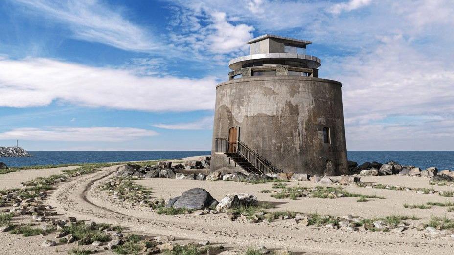 A CGI picture of a large cylindrical stone structure on a beach with the sea in the background