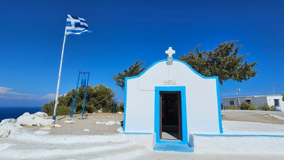 Prophet Elias Monastery in Faliraki, Rhodes - with a view of the sea behind.