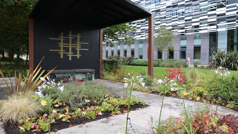 Garden at MMU with a design is inspired by the digital world with rebar arbours and fences mimicking cables, and laser-cut panels replicating circuit board patterns.