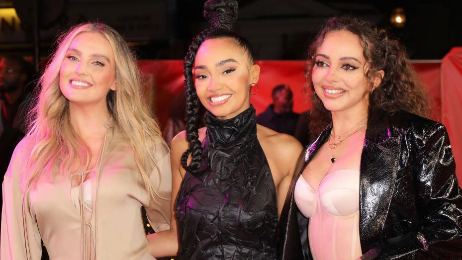 Perrie Edwards, Leigh-Ann Pinnock and Jade Thirlwall pictured together in 2021.