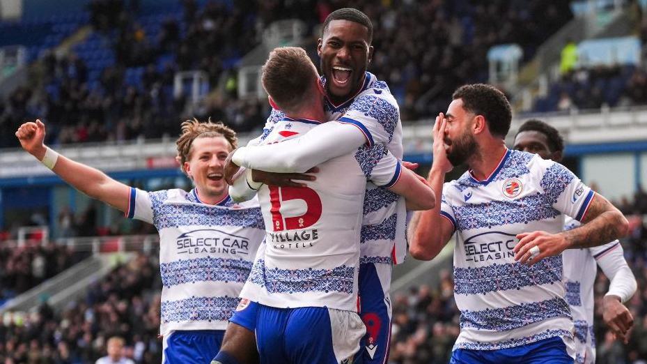Reading celebrate a goal by Kelvin Ehibhatiomhan against Wigan