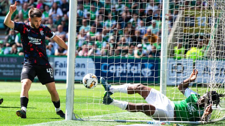 Rangers' Nicolas Raskin and Hibernian's Rocky Bushiri