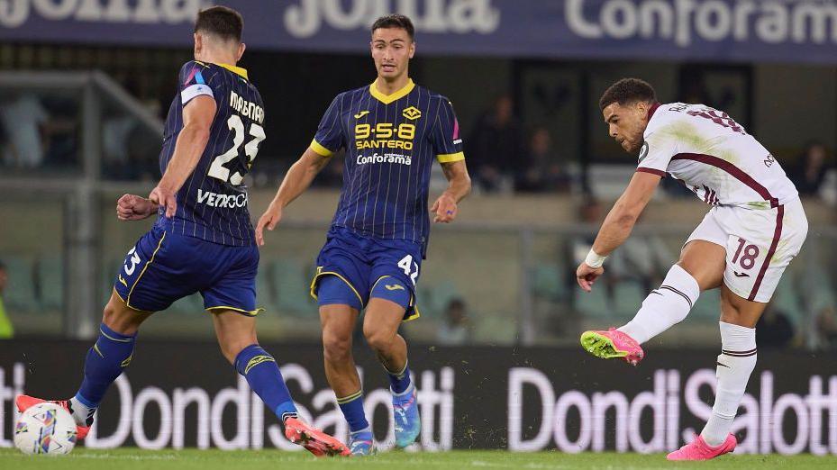 Torino's Che Adams scores