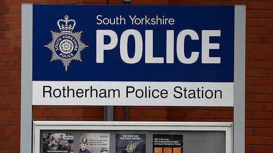 A photo of the entrance sign at Rotherham Police Station.