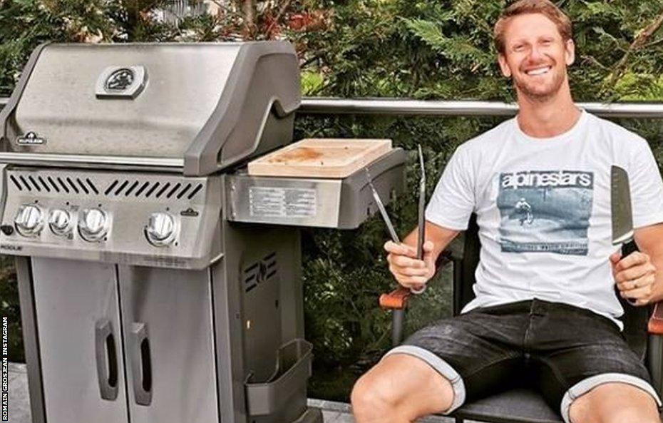 Romain Grosjean Instagram showing him holding barbecue tongs