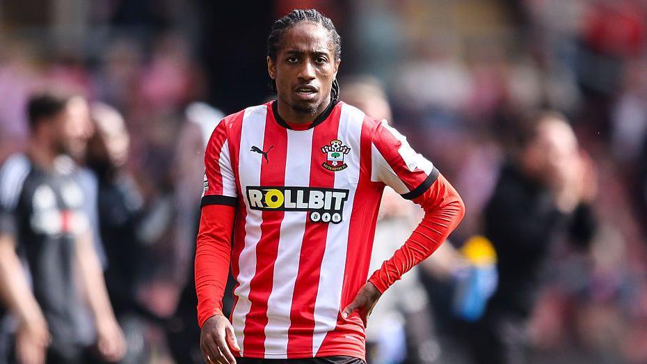 Kyle Walker-Peters of Southampton looks on