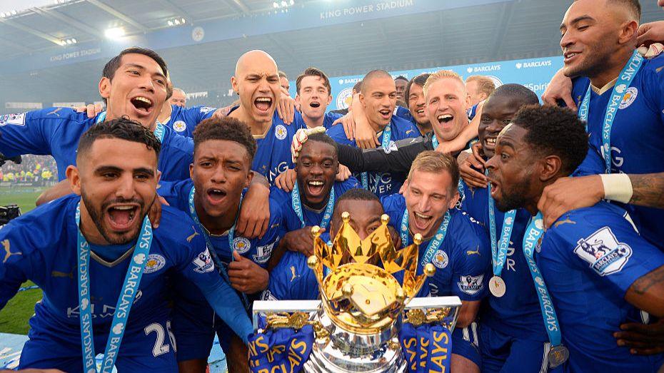Leicester players lift the Premier League title