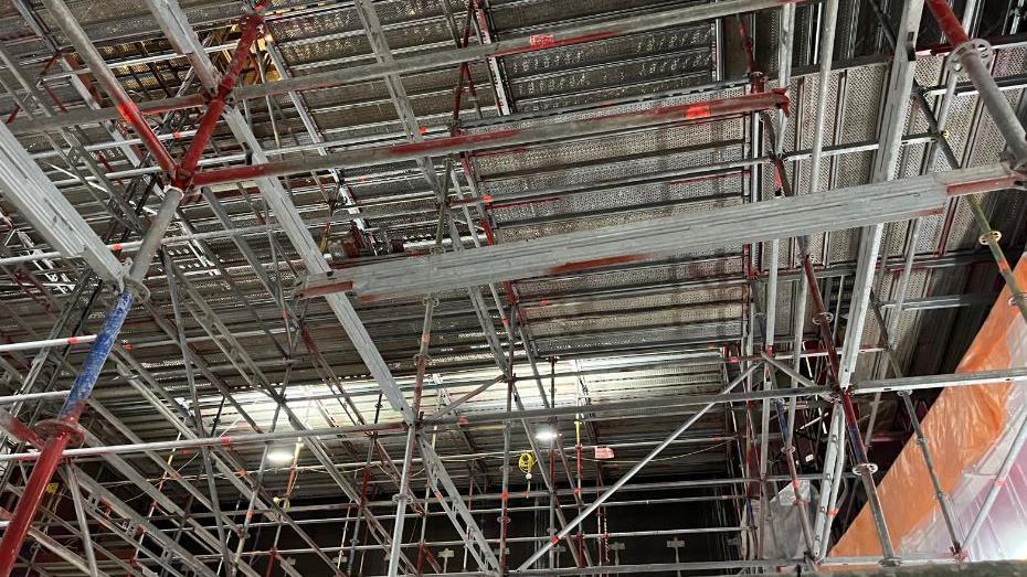 Interior close up shot of lots of scaffolding covering the roof of the Orchard Theatre in Dartford 