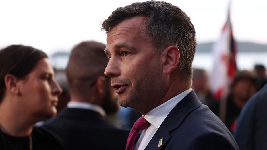 Act leader David Seymour speaks to media after a service to commemorate Waitangi Day at the Waitangi Treaty Grounds on February 06, 2025