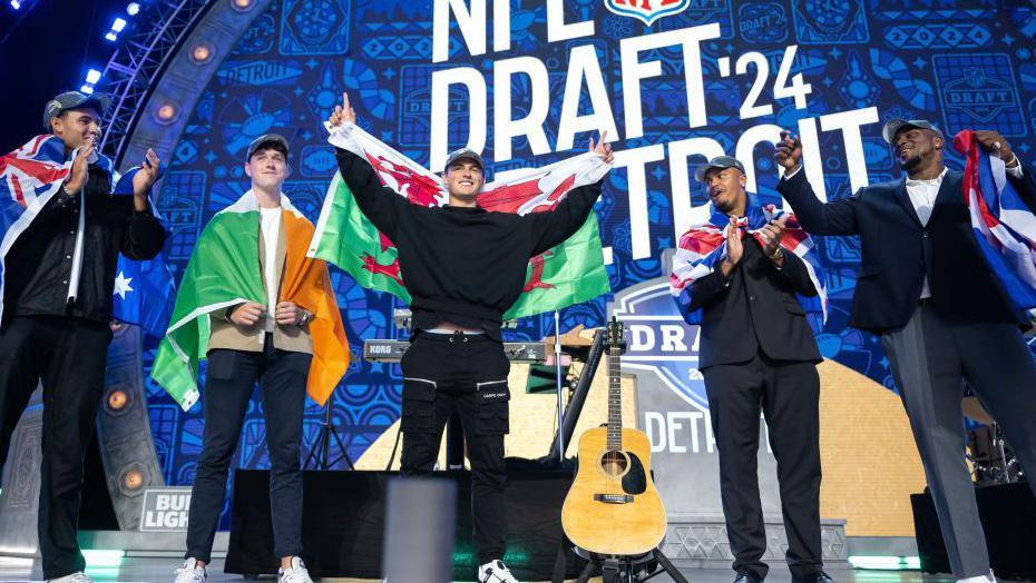 Patrick Murtagh, Charlie Smyth, Louis Rees-Zammit, Travis Clayton and Bayron Matos on stage at the NFL Draft in 2024