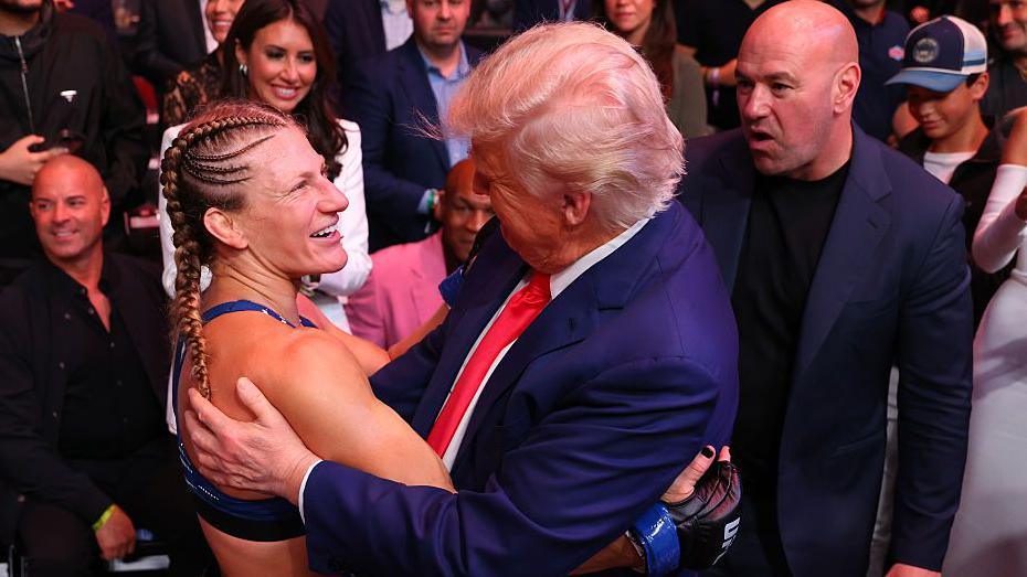 Donald Trump embraces Kayla Harrison
