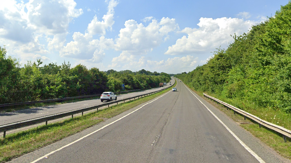 A Google Street View image of the A41 on a bright sunny day. Several vehicles can be seen.