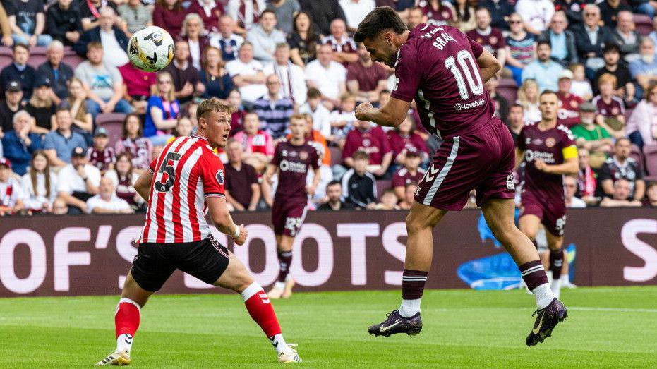 Hearts' Claudio Braga scores