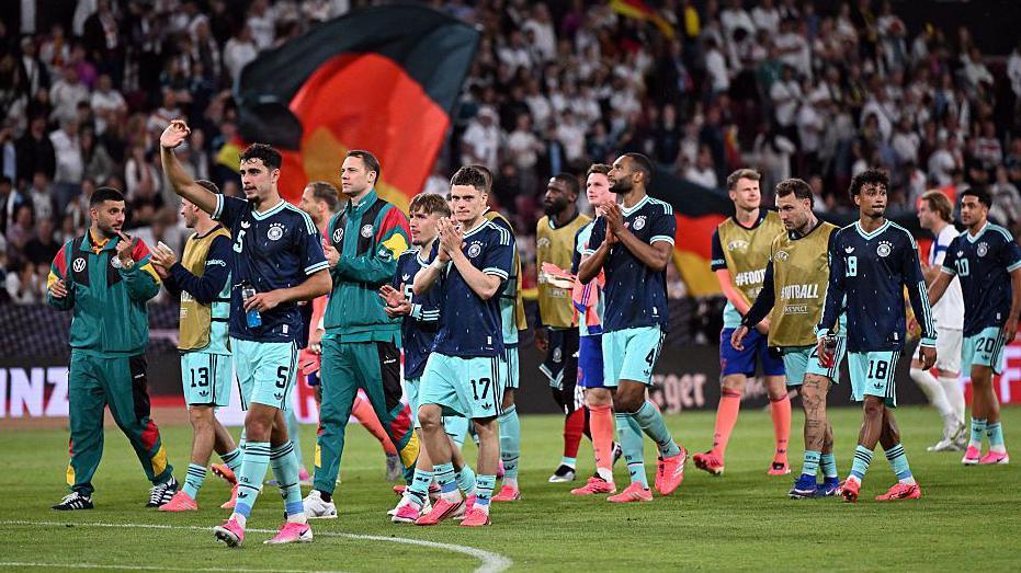 Germany squad waving to the crowd
