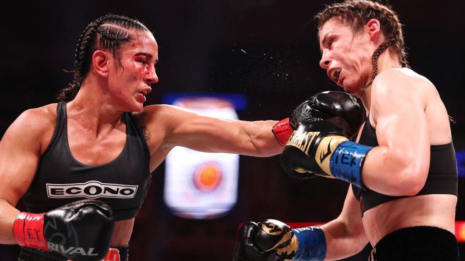 Amanda Serrano punches Katie Taylor