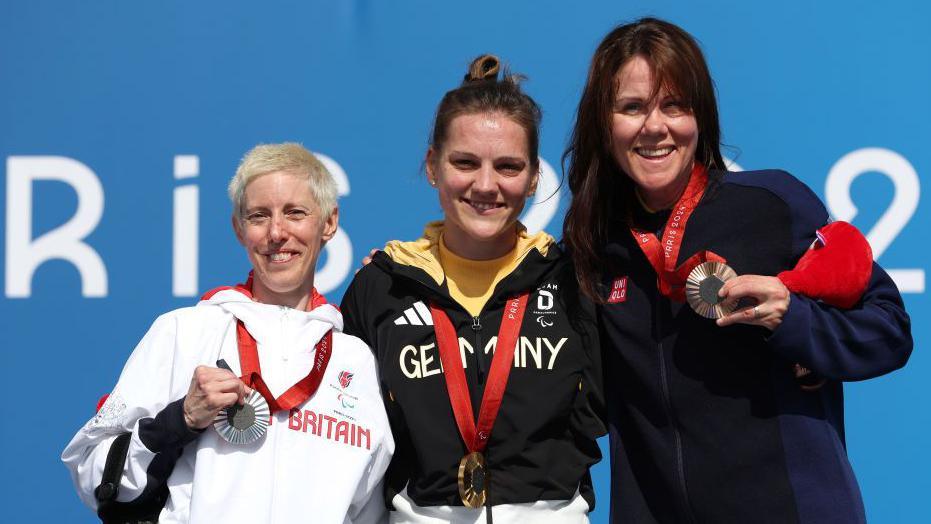 Fran Brown poses with her medal