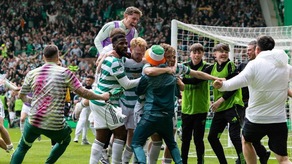 Fans ran on to the pitch at Celtic Park after Callum Osmand scored
