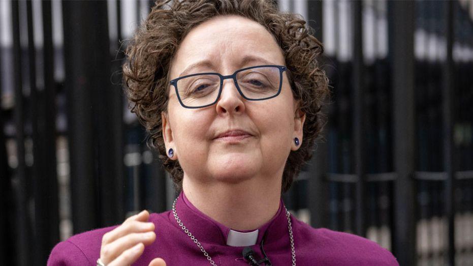 A file photo of the Bishop of Stepney, Dr Joanne Grenfell. She is wearing a clerical collar 