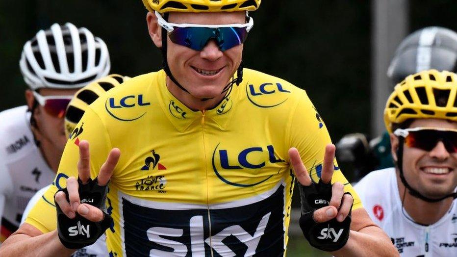 Chris Froome celebrates his fourth Tour win