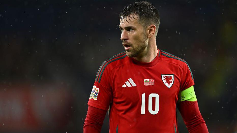 Aaron Ramsey playing for Wales