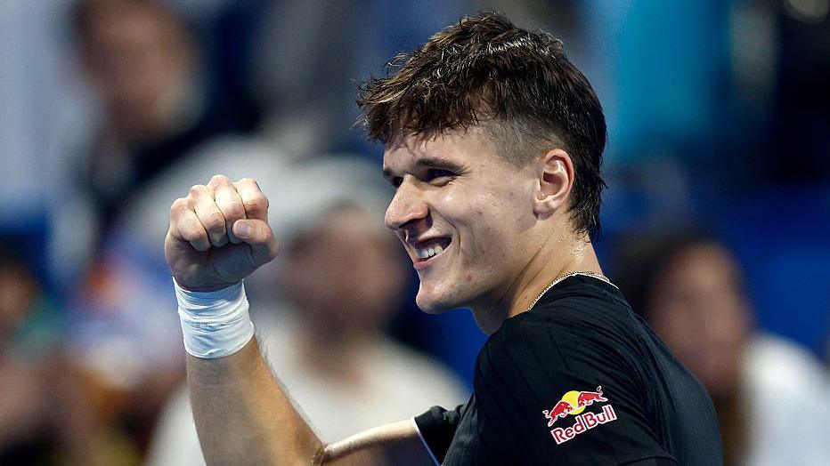 Jakub Mensik celebrates beating Jannik Sinner at the Qatar Open