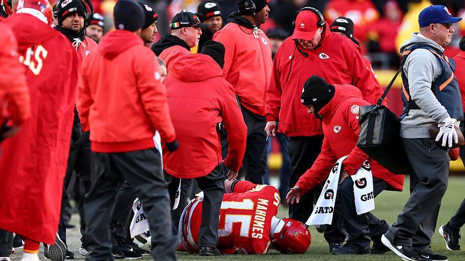 Patrick Mahomes lies on the field injured during the Kansas City Chiefs' defeat to the Los Angeles Chargers