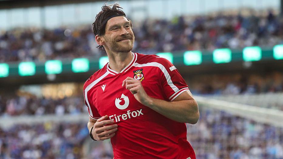 Kieffer Moore celebrates 