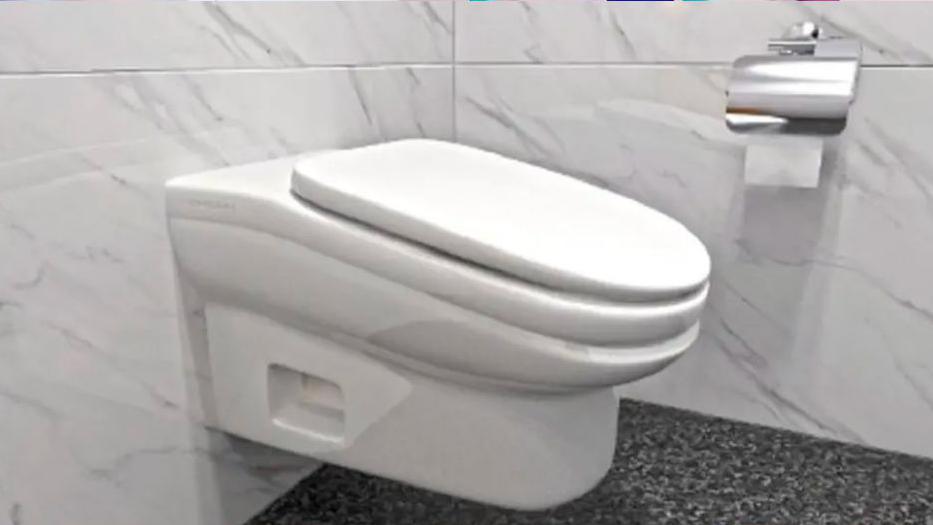 Toilet with slope