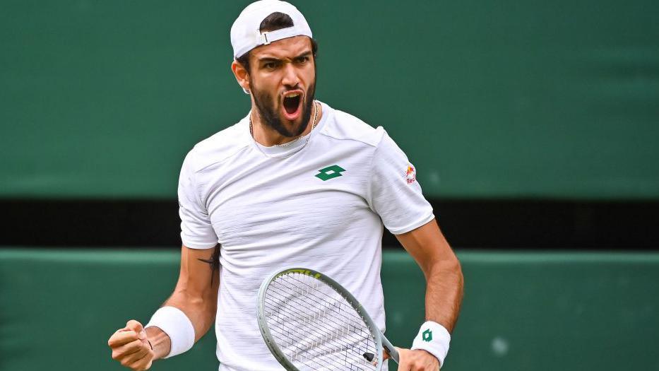 Matteo Berrettini celebrates winning a point