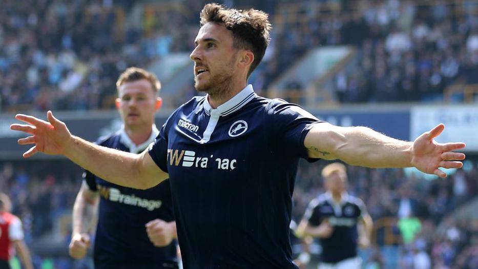 Lee Gregory celebrates after scoring for Millwall