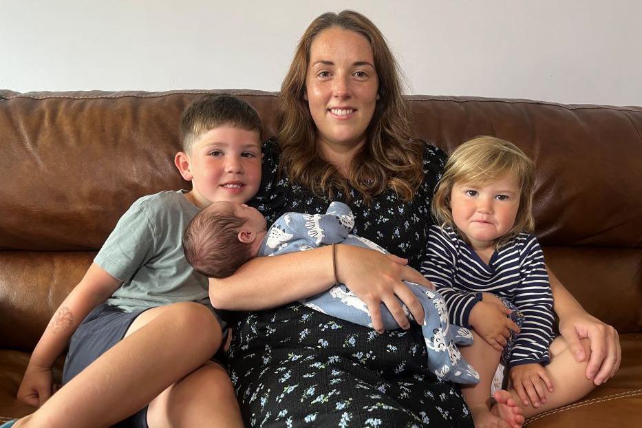 Kate and her children at home