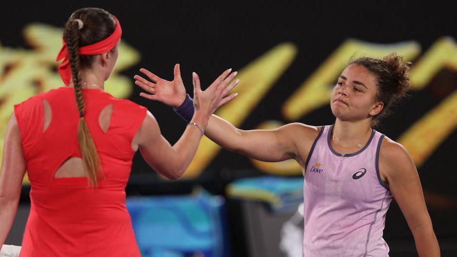 Jasmine Paolini shakes hands with Elina Svitolina in Melbourne