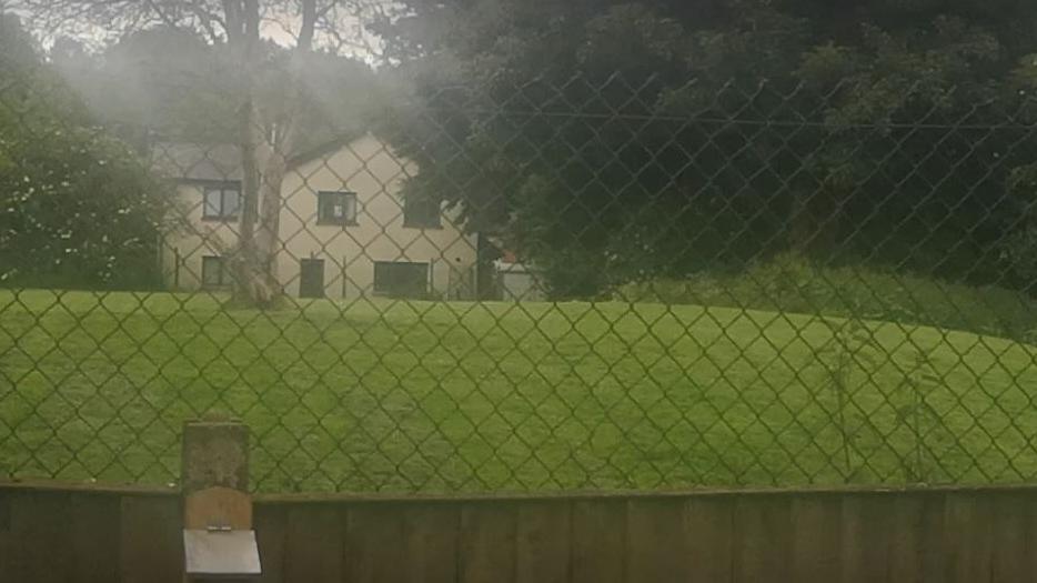 Photograph of land behind Sulby Street in Stoneclough - before the land was developed without planning permission