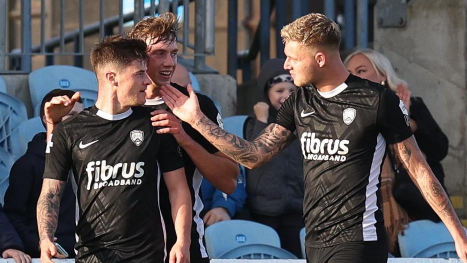 Rhyss Campbell celebrates his goal with Matthew Shevlin