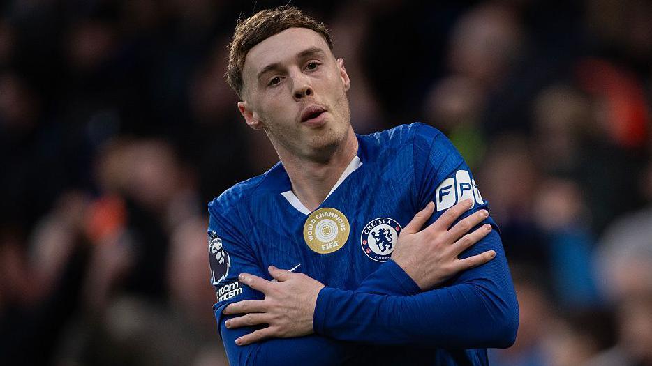 Cole Palmer celebrates scoring for Chelsea against Everton at Stamford Bridge