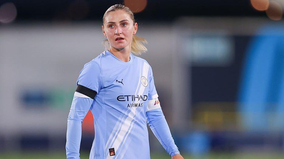 Laura Coombs with Manchester City